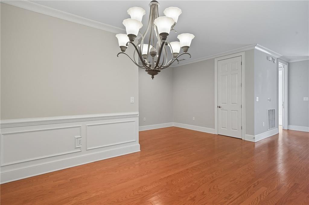 4950 Ivy Ridge Drive Southeast, Unit 203 Atlanta, GA 30339 - Photo 11 of 39 a view of a small space with wooden floor