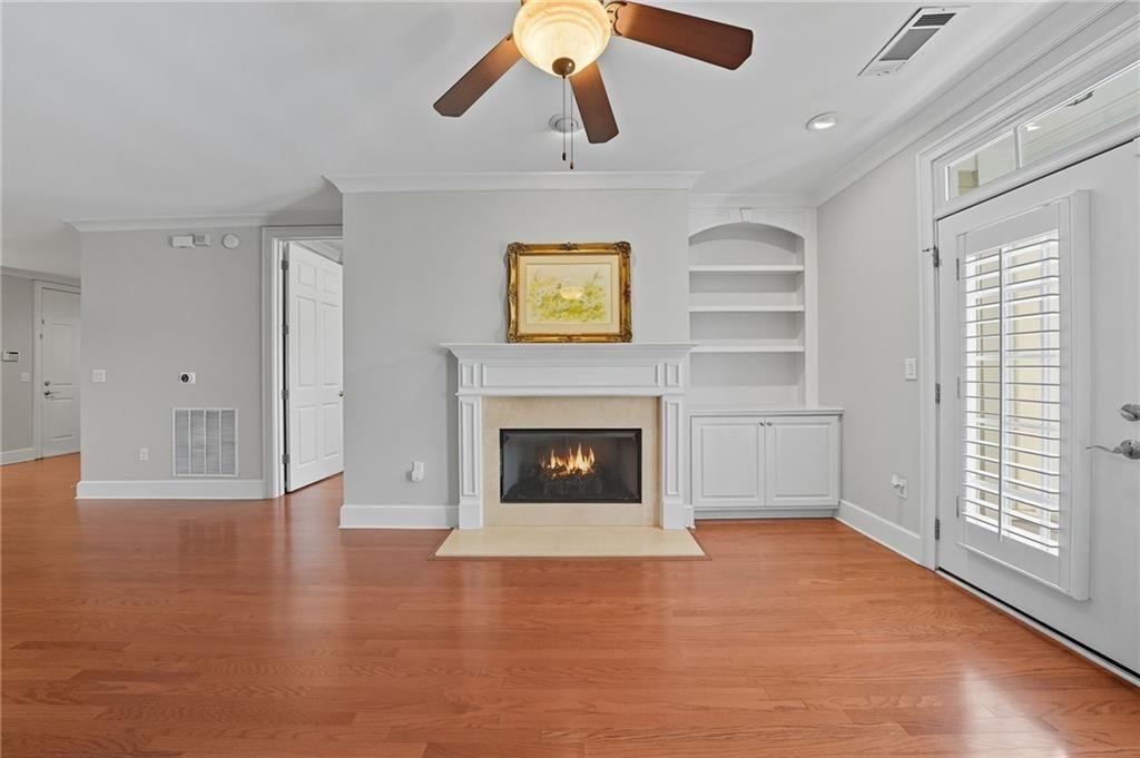 4950 Ivy Ridge Drive Southeast, Unit 203 Atlanta, GA 30339 - Photo 16 of 39 a view of a livingroom with a fireplace and window