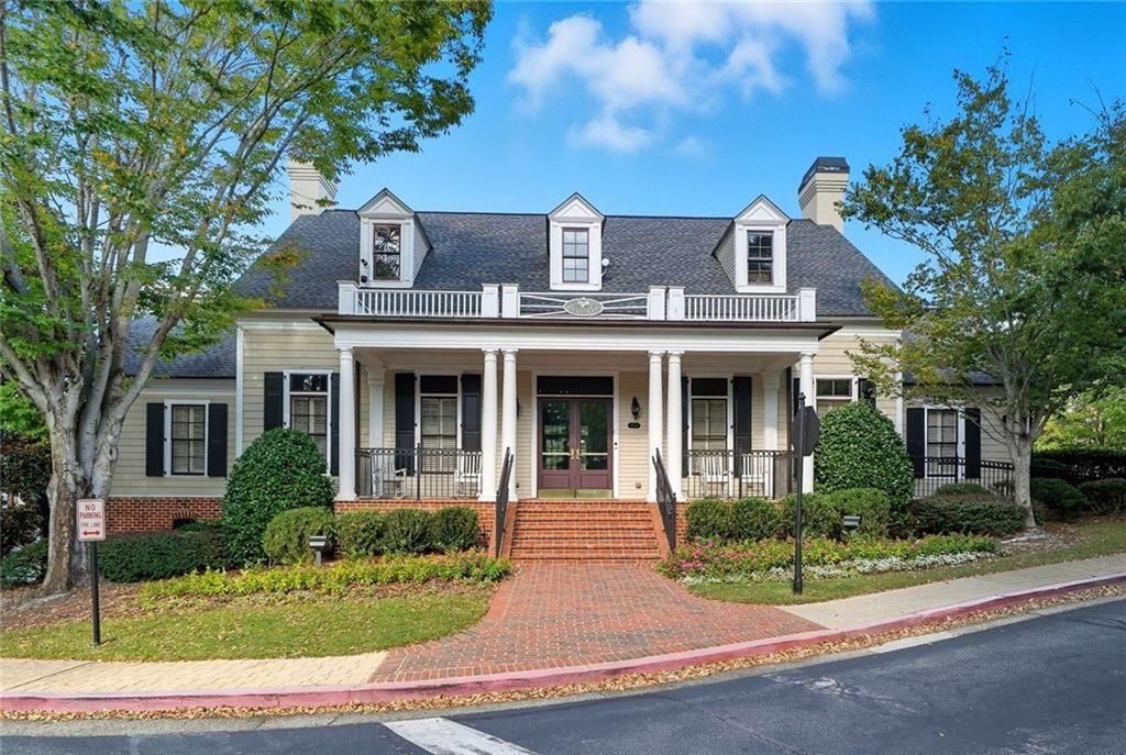 4950 Ivy Ridge Drive Southeast, Unit 203 Atlanta, GA 30339 - Photo 30 of 39 front view of a house with a yard
