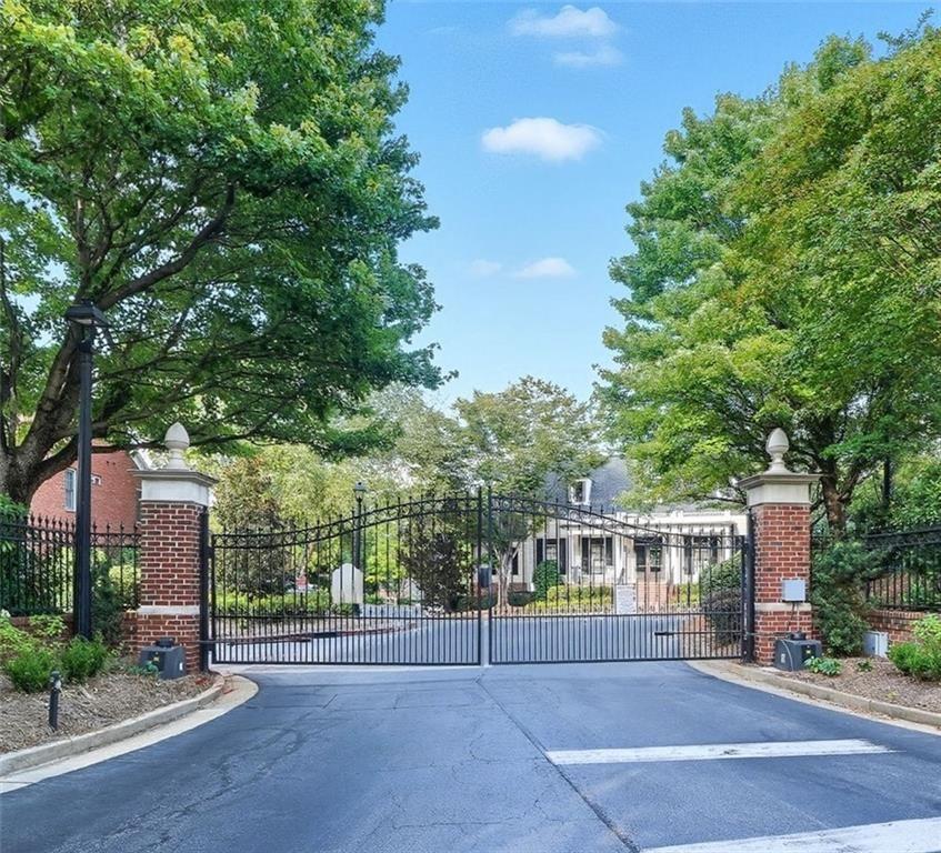 4950 Ivy Ridge Drive Southeast, Unit 203 Atlanta, GA 30339 - Photo 34 of 39 a view of a house with a street