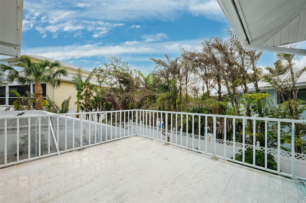 311 Poinsettia Road Anna Maria, FL 34216 - Photo 29 of 36 a view of a balcony