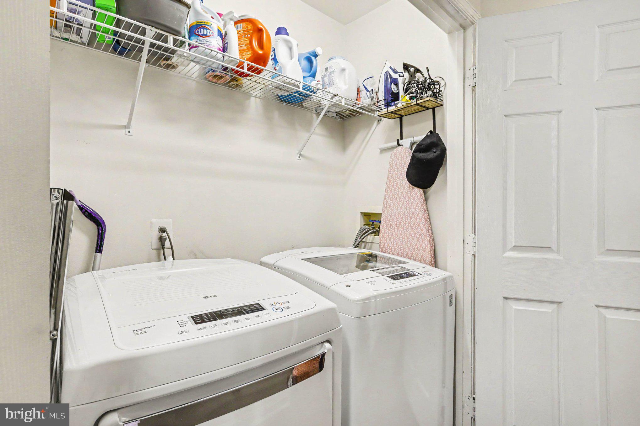 6513 Ridgeborne Drive Baltimore, MD 21237 - Photo 28 of 38 Efficient laundry space with storage.
