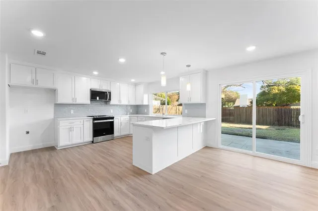 $425,000 | 1528 West Spring Creek Parkway, Plano, TX 75023