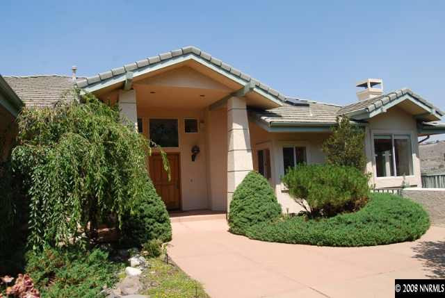 45 Rimfire Circle Reno, NV 89519 - Photo 1 of 9 front view of a house with a yard
