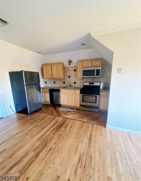 512 Chestnut Street, Unit E Union, NJ 07083 - Photo 5 of 5 a living room with furniture and a flat screen tv