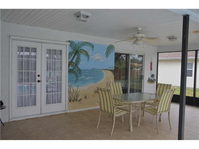 155 Midvale Terrace Sebastian, FL 32958 - Photo 14 of 16 a dining room with furniture and window