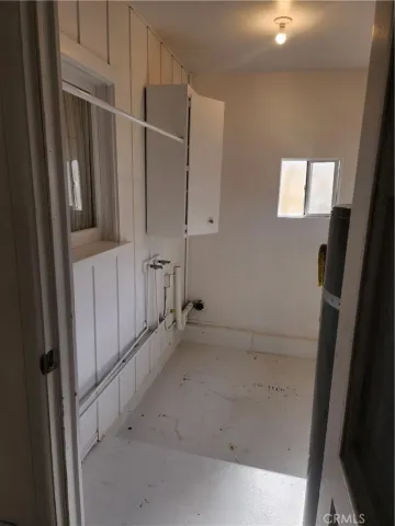 a view of a workspace with furniture