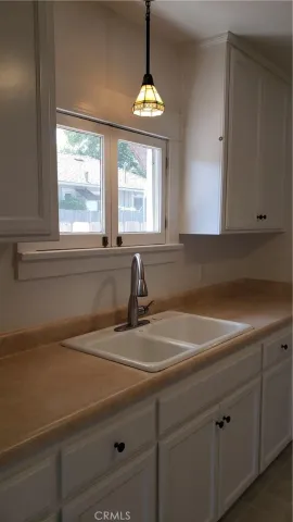 an empty room with a empty space and window