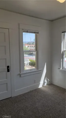 a picture of a bench in front of a door