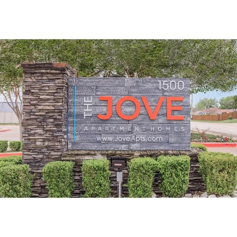 1500 South Jupiter Road, Unit 607 Allen, TX 75002 - Photo 6 of 7 a sign that is on a brick wall