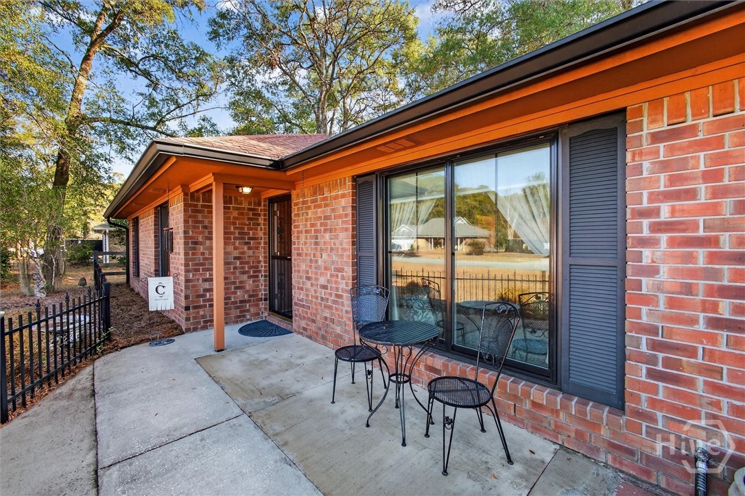131 Deerwood Court Rincon, GA 31326 - Photo 5 of 54 Extended Front Porch Sitting Area