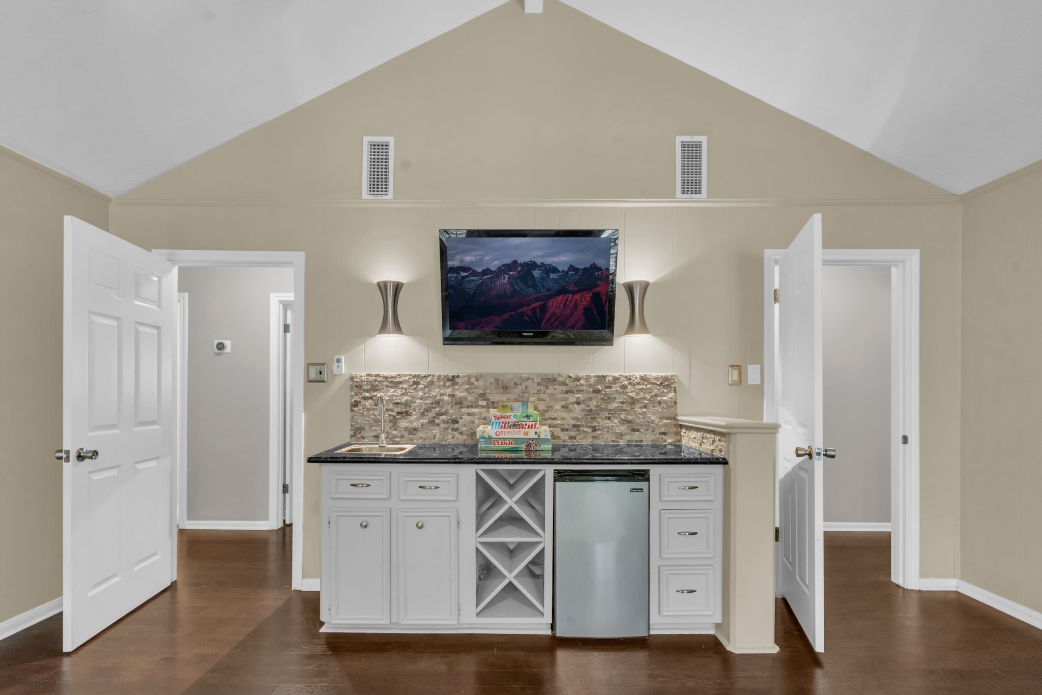 6514 Larkmount Drive Spring, TX 77389 - Photo 31 of 41 The flex space includes a thoughtfully designed built in wet bar with mini fridge and granite countertop.