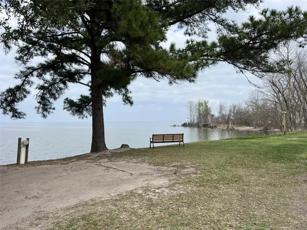 a view of street with parked cars