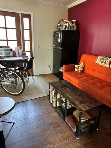 a bed room with furniture and a window