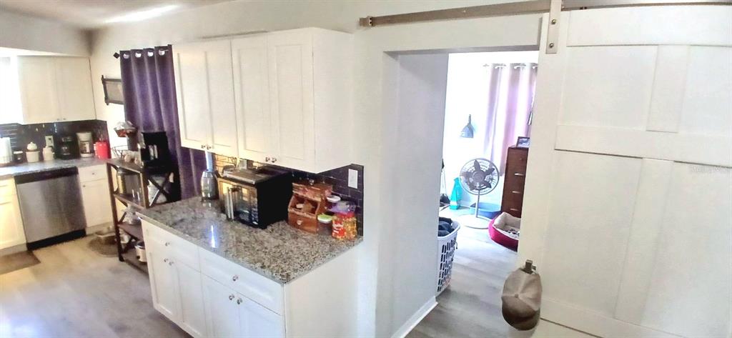 9643 Marlinton Lane Port Richey, FL 34668 - Photo 12 of 31 a room with storage and utility