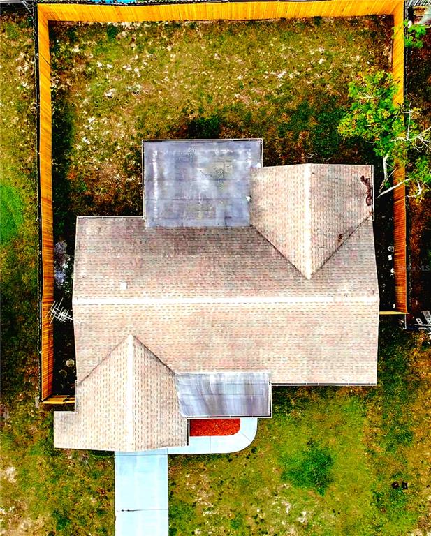 9643 Marlinton Lane Port Richey, FL 34668 - Photo 7 of 31 an aerial view of residential houses with outdoor space