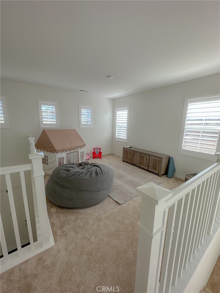 39547 Verbena Way Temecula, CA 92591 - Photo 14 of 31 a bedroom with a bed and a window