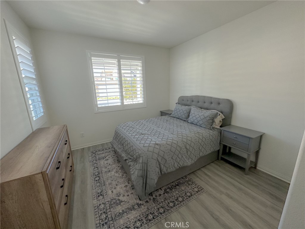 39547 Verbena Way Temecula, CA 92591 - Photo 15 of 31 a bedroom with a bed and a window