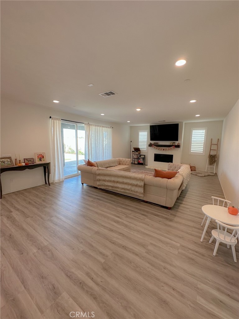 39547 Verbena Way Temecula, CA 92591 - Photo 6 of 31 a room with furniture and a wooden floor