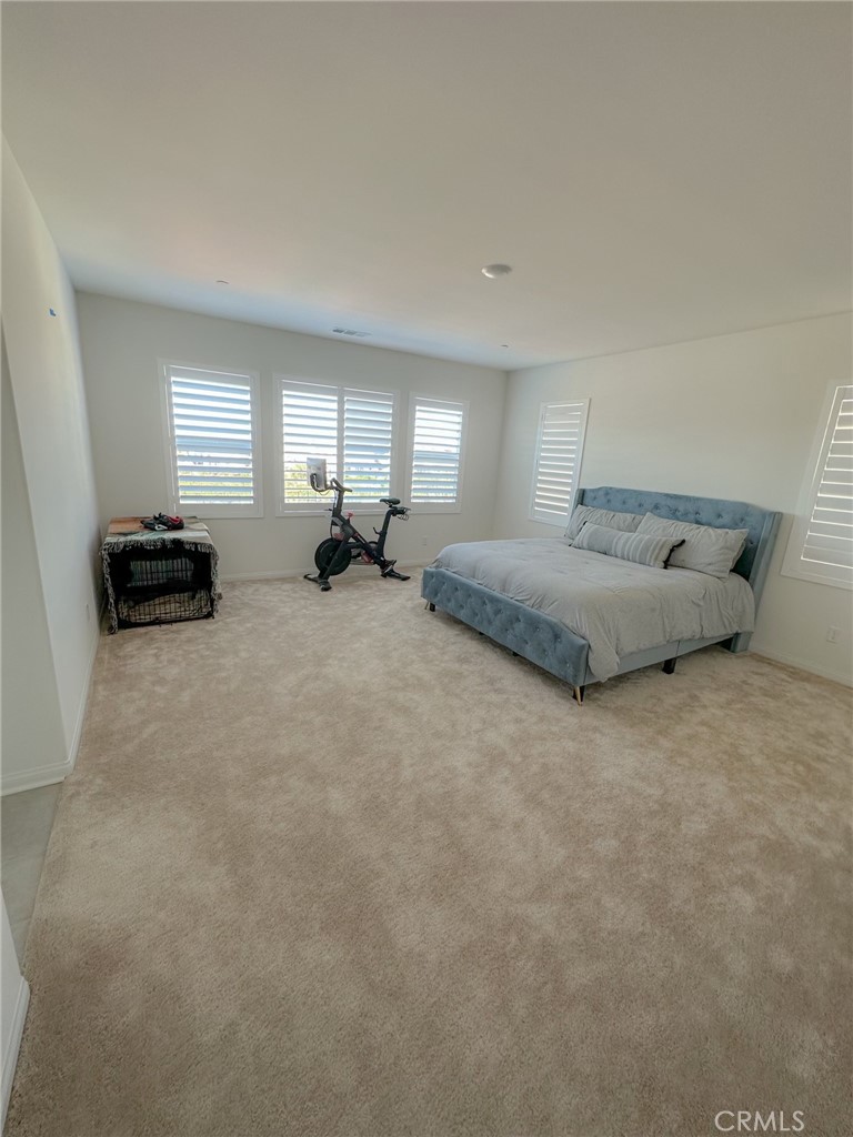 39547 Verbena Way Temecula, CA 92591 - Photo 9 of 31 a bed room with furniture and a window