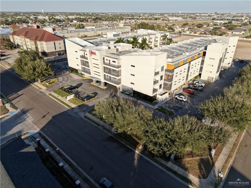 813 Travis Street, Unit 207 Mission, TX 78572 - Photo 38 of 38 an aerial view of residential houses with outdoor space