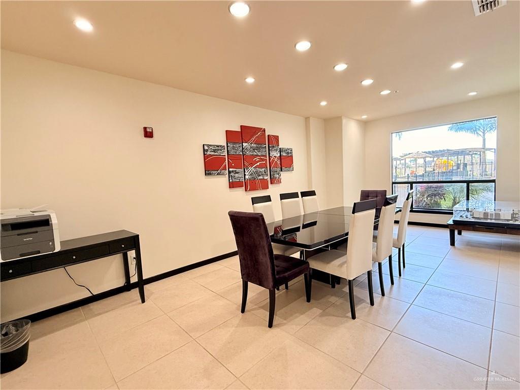 813 Travis Street, Unit 207 Mission, TX 78572 - Photo 10 of 38 a view of a dining room with furniture
