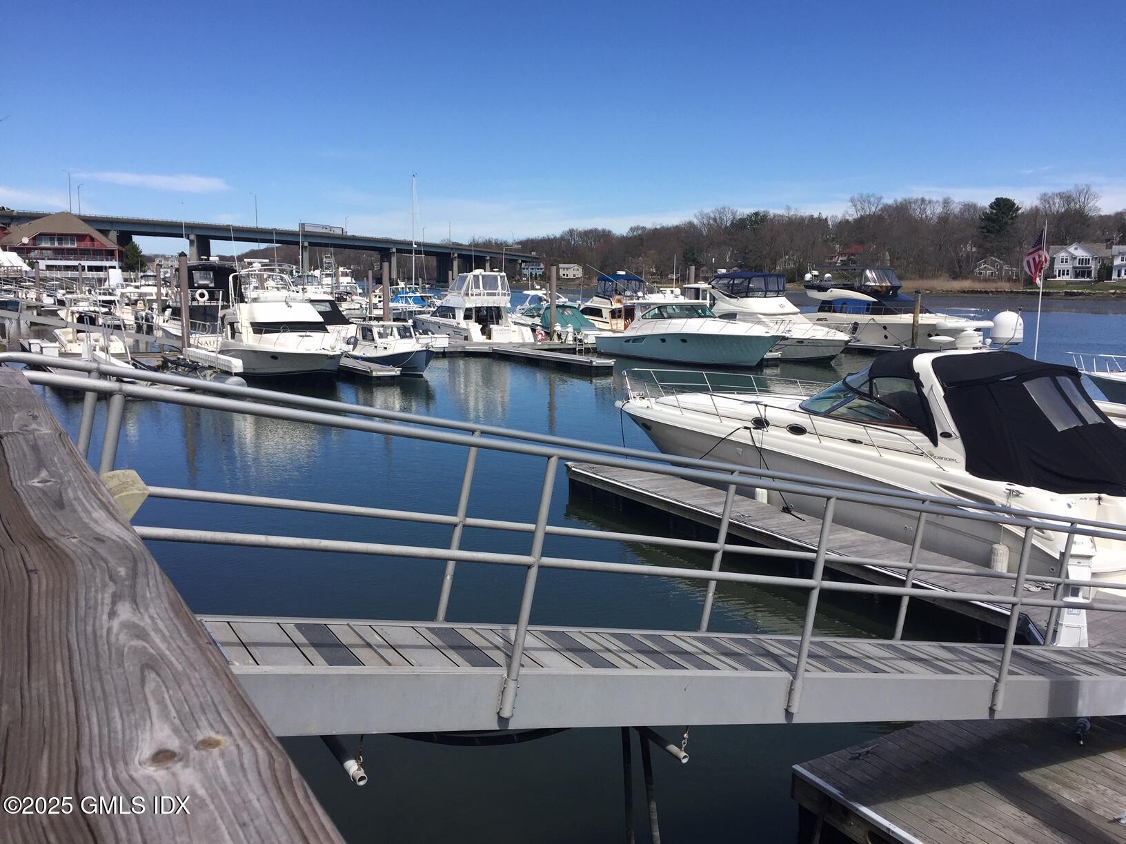 7 River Road, Unit BOAT SLIP D14 Cos Cob, CT 06807 - Photo 6 of 7 a view of a balcony with an ocean view