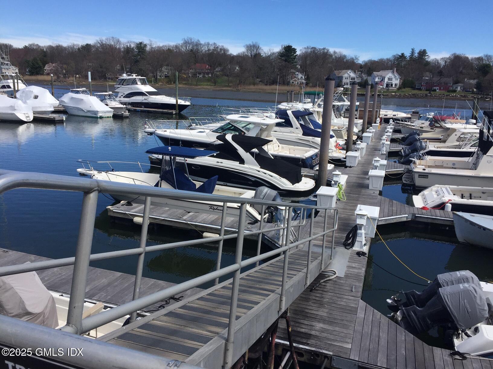 7 River Road, Unit BOAT SLIP D14 Cos Cob, CT 06807 - Photo 7 of 7 a view of a lake with sitting area