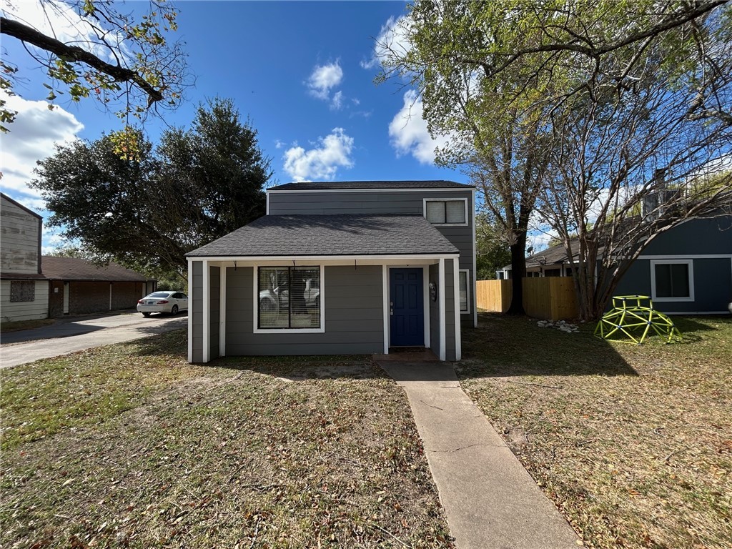 1500 Lemon Tree Lane College Station, TX 77840 - Photo 1 of 17 a front view of a house with a yard
