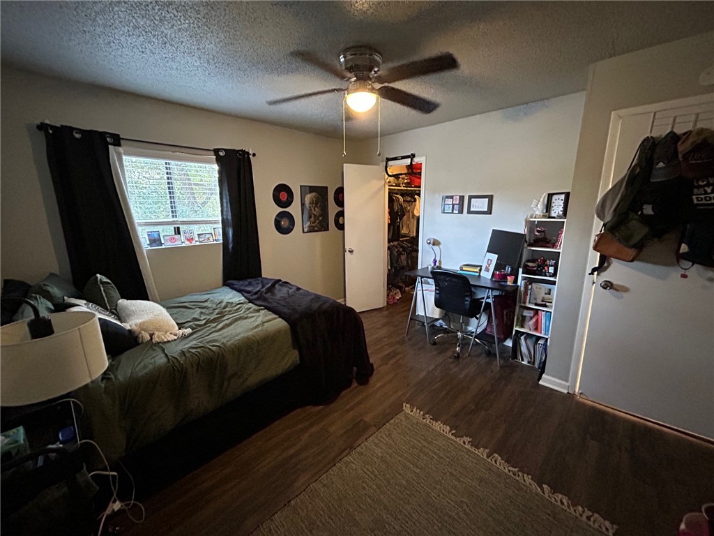 1500 Lemon Tree Lane College Station, TX 77840 - Photo 14 of 17 a bedroom that has a bed and a chair in it