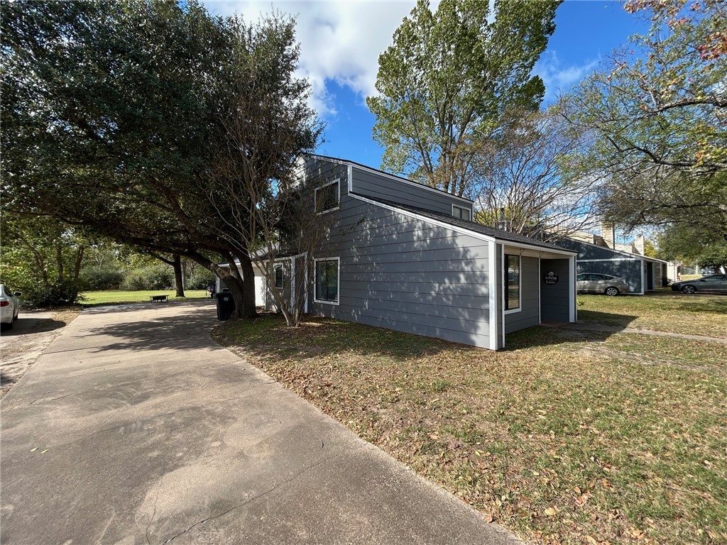 1500 Lemon Tree Lane College Station, TX 77840 - Photo 16 of 17 a view of a yard with a tree