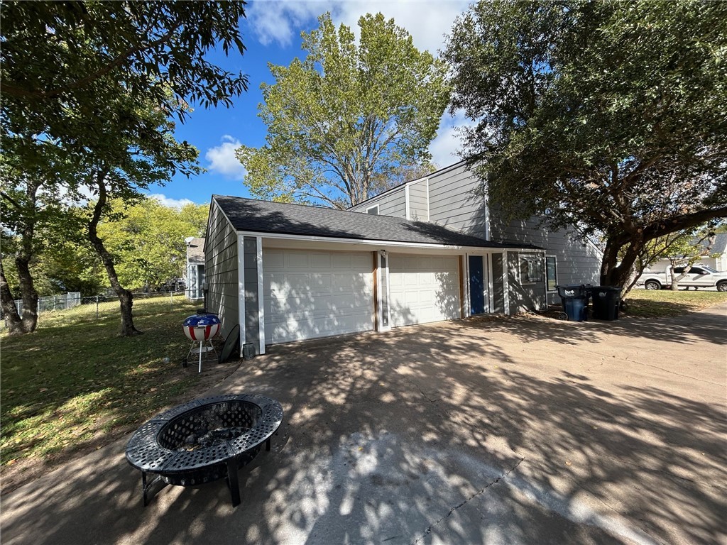 1500 Lemon Tree Lane College Station, TX 77840 - Photo 2 of 17 a view of a house with backyard and sitting area