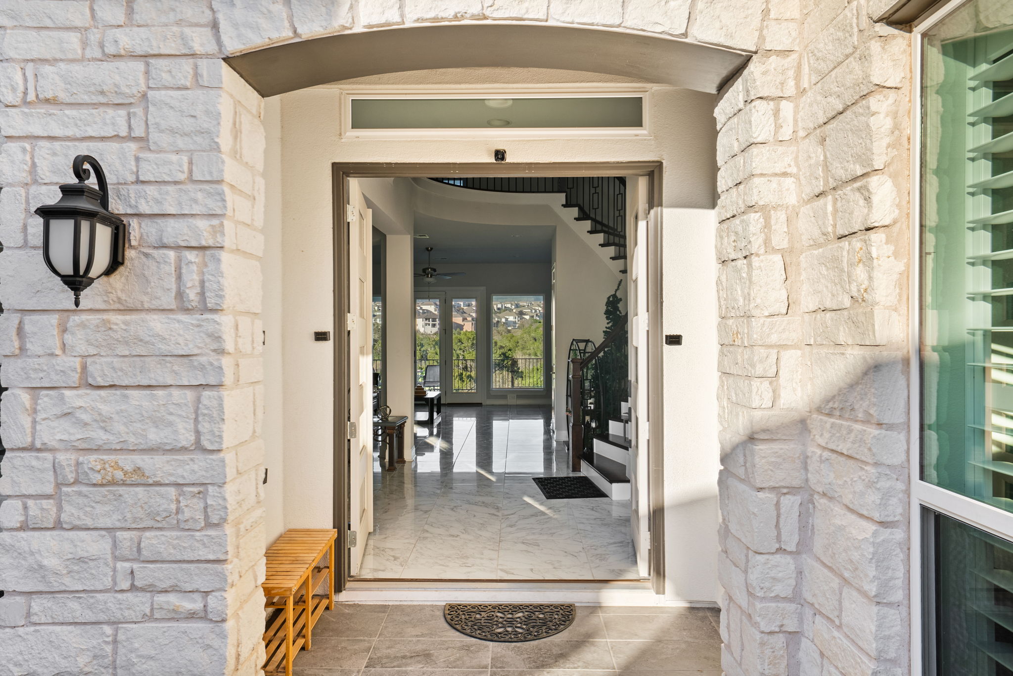 2132 Novara Trail Leander, TX 78641 - Photo 13 of 40 Entrance to property featuring french doors and stone siding