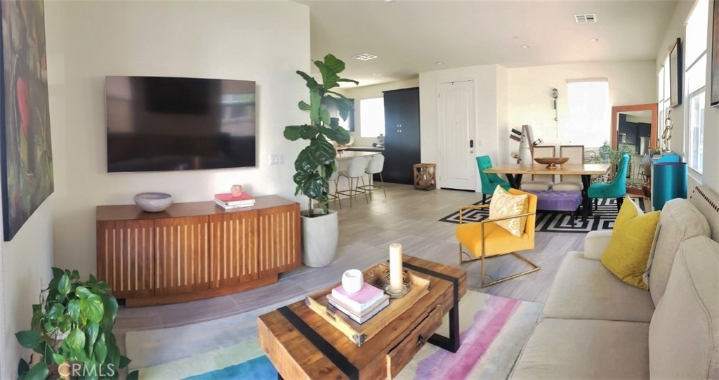 4120 Mission Tree Way Oceanside, CA 92057 - Photo 11 of 56 a living room with furniture and a flat screen tv