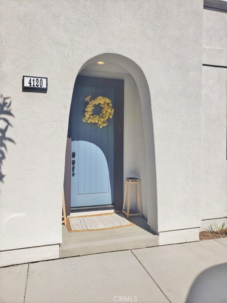4120 Mission Tree Way Oceanside, CA 92057 - Photo 2 of 56 a view of front door with wooden floor