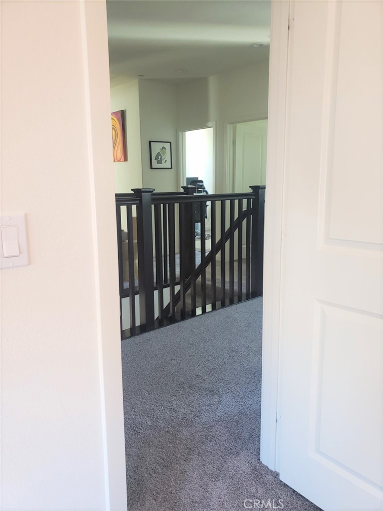 4120 Mission Tree Way Oceanside, CA 92057 - Photo 26 of 56 a view of a livingroom with wooden floor