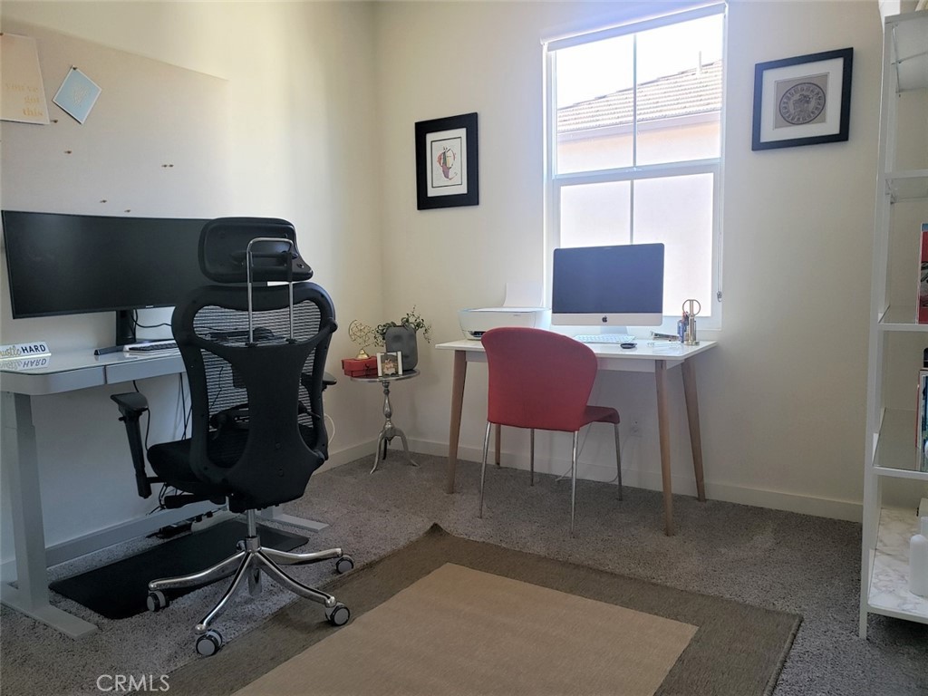4120 Mission Tree Way Oceanside, CA 92057 - Photo 35 of 56 a view of workspace with wooden floor windows