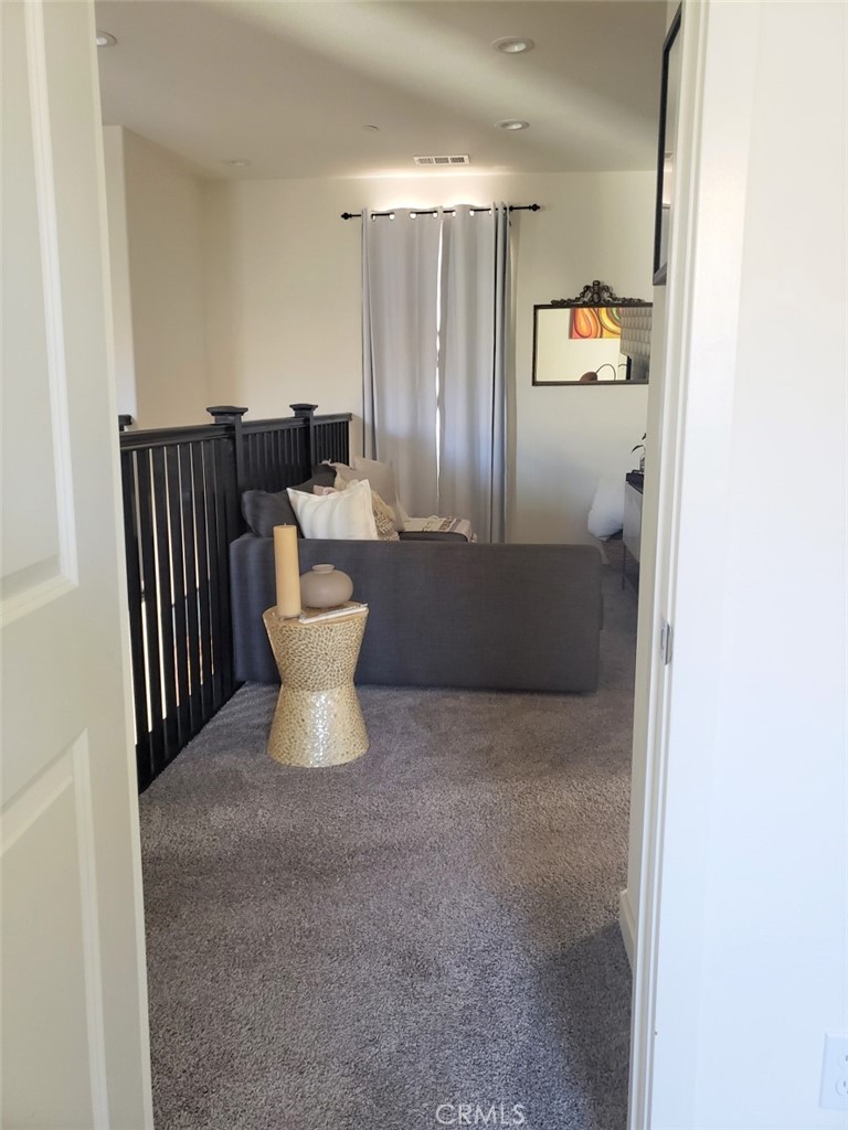 4120 Mission Tree Way Oceanside, CA 92057 - Photo 37 of 56 a view of a hallway with seating area