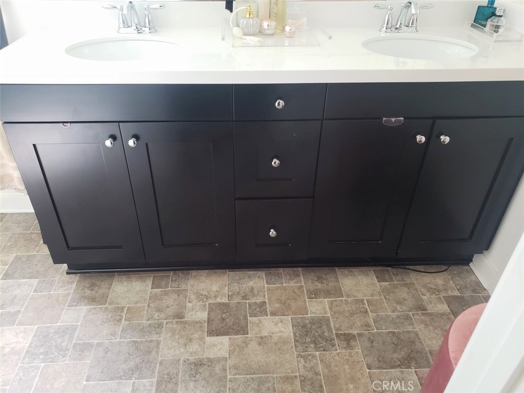 4120 Mission Tree Way Oceanside, CA 92057 - Photo 41 of 56 a bathroom with a sink