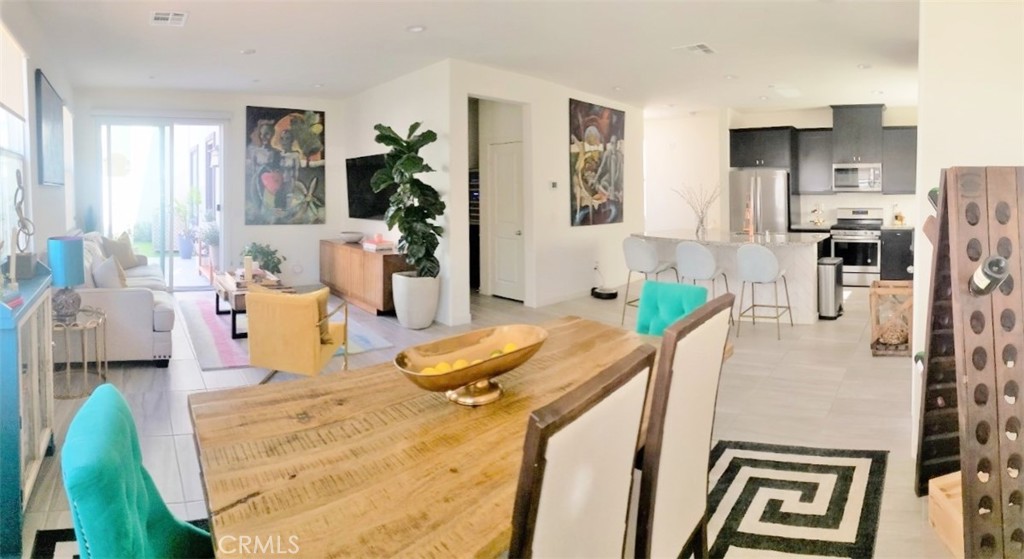 4120 Mission Tree Way Oceanside, CA 92057 - Photo 5 of 56 a living room with furniture and a table