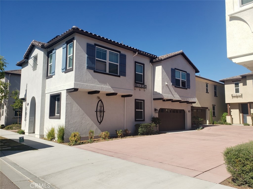 4120 Mission Tree Way Oceanside, CA 92057 - Photo 51 of 56 a front view of a house with a yard