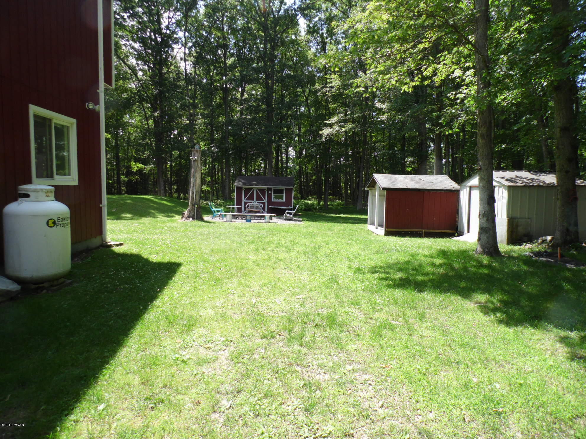 121 Weasel Road Dingmans Ferry, PA 18328 - Photo 39 of 40 Right side yard
