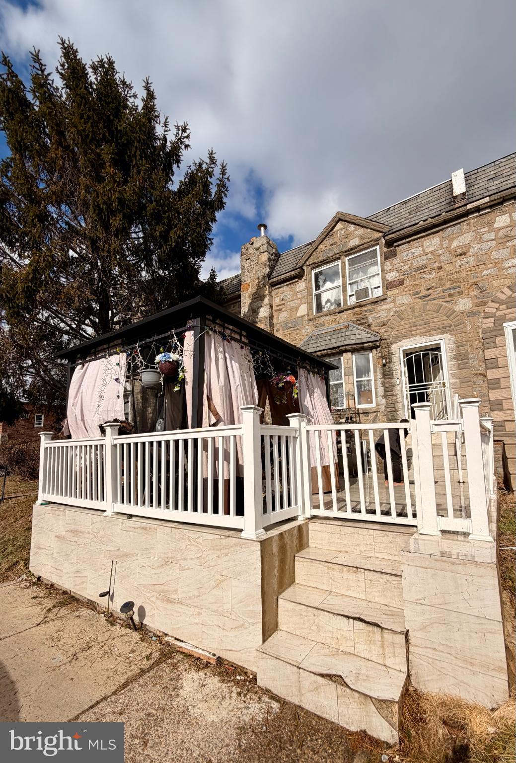 1305 Robbins Street Philadelphia, PA 19111 - Photo 19 of 19 a view of a house with wooden deck