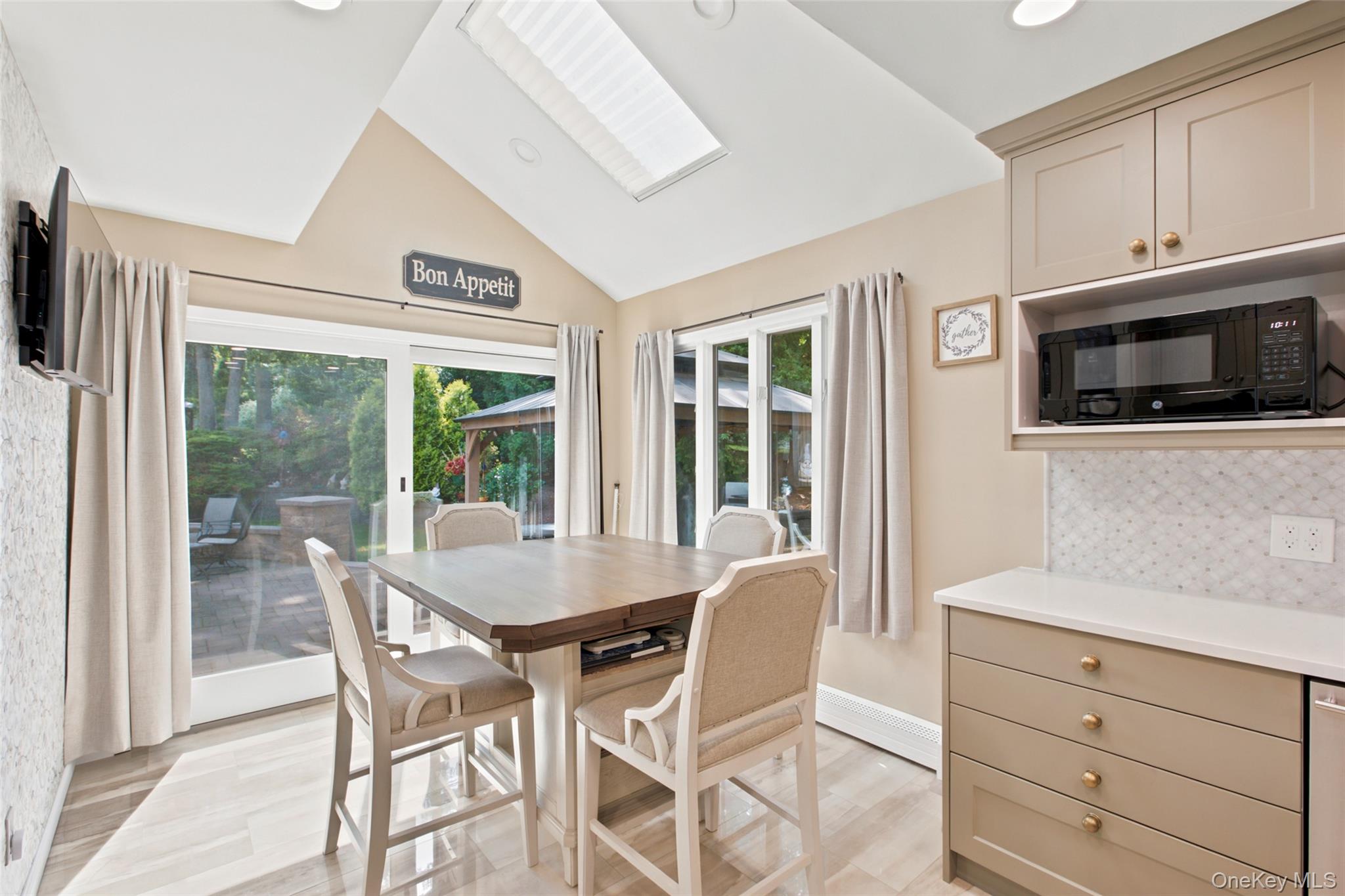 17 Lower Road Smithtown, NY 11787 - Photo 10 of 29 kitchen with sliders to back yard