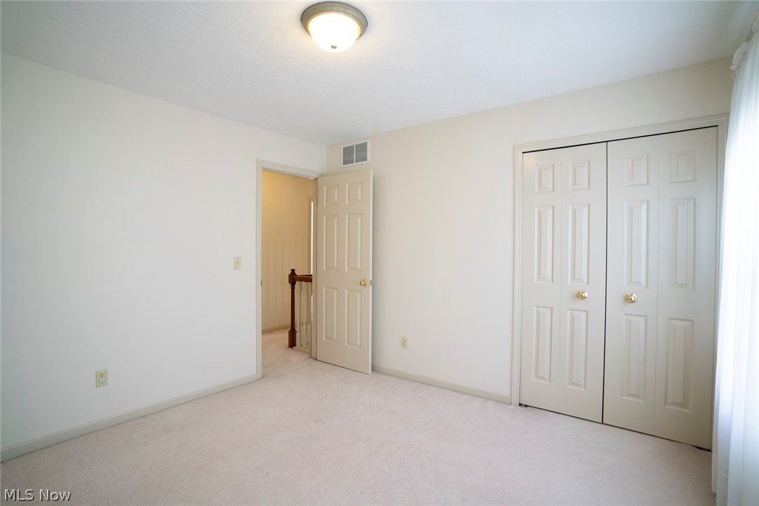 1380 Walnut Ridge Drive Uniontown, OH 44685 - Photo 25 of 35 Bedroom 2 with good closet space!