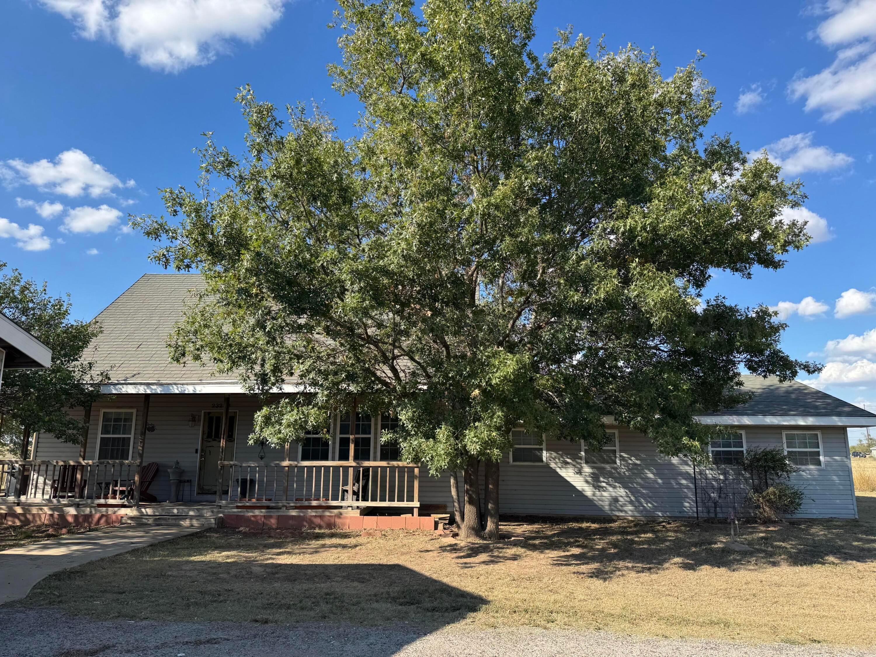 a front view of a building with street view