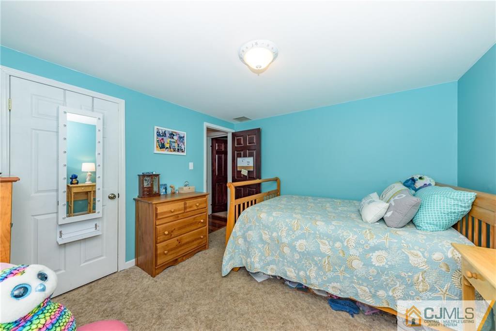 148 Rolling Ridge Road West Milford, NJ 07480 - Photo 15 of 25 a bedroom with a bed and furniture