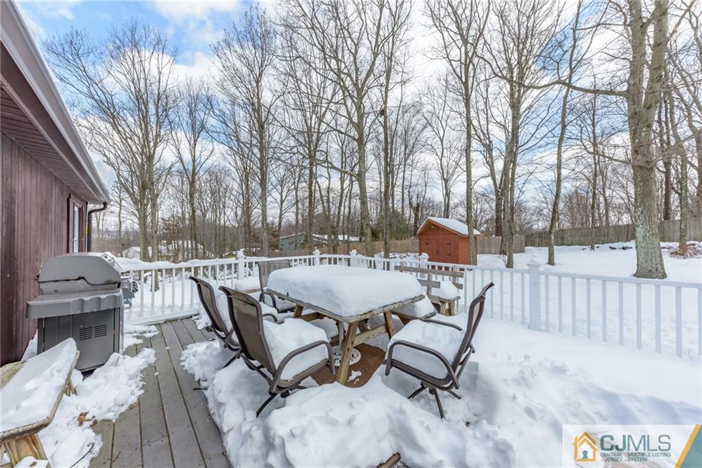 148 Rolling Ridge Road West Milford, NJ 07480 - Photo 23 of 25 a view of a patio with a table and chairs