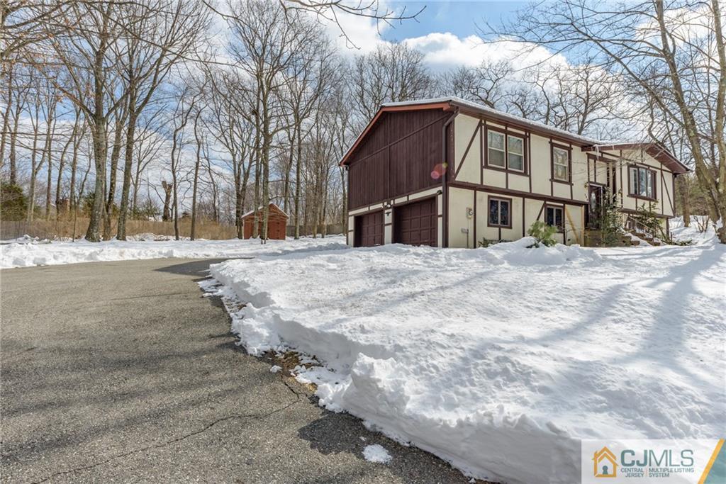 148 Rolling Ridge Road West Milford, NJ 07480 - Photo 25 of 25 a view of a house with snow on the background