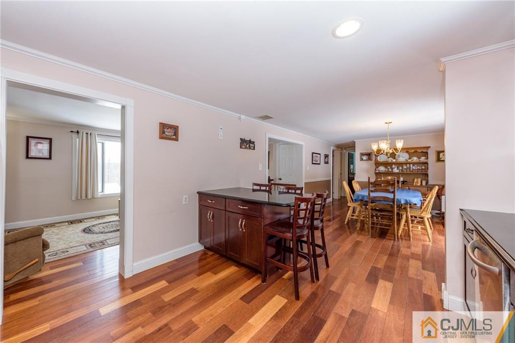 148 Rolling Ridge Road West Milford, NJ 07480 - Photo 10 of 25 a view of a dining room with furniture and wooden floor